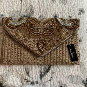 Lulu’s gold beaded clutch